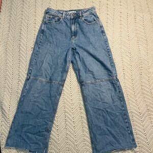 Light Blue Straight Leg Jeans with Worn Look